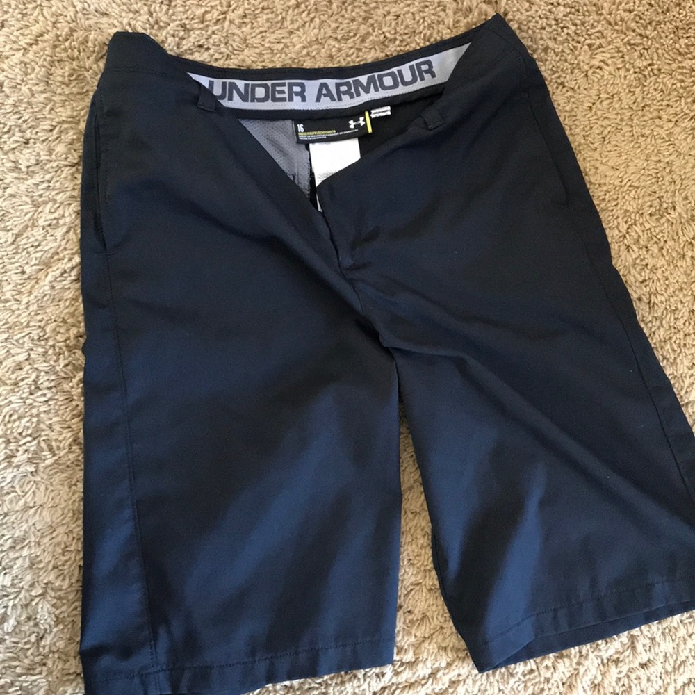 Boys size 16 a Under Armour golf shorts.